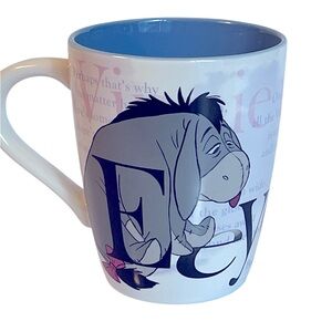 Walt Disney Unique Eeyore Ceramic Mug with White/Blue/Gray/Pink Coloring.  16 oz